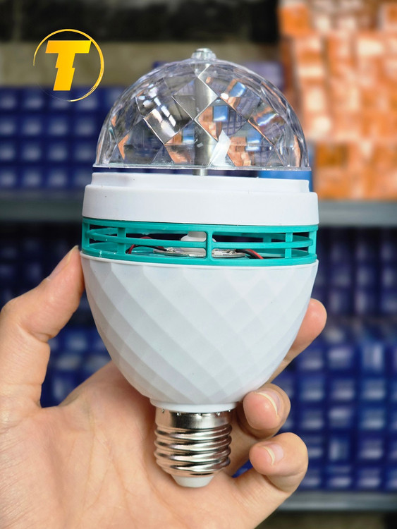 لامپ رقص نور گردان KT-W998 از زاویه جانبی، با پایه پیچی E27 و طراحی کروی منشوری شفاف.